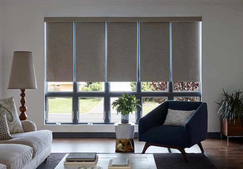 electronic window treatment in living room of home